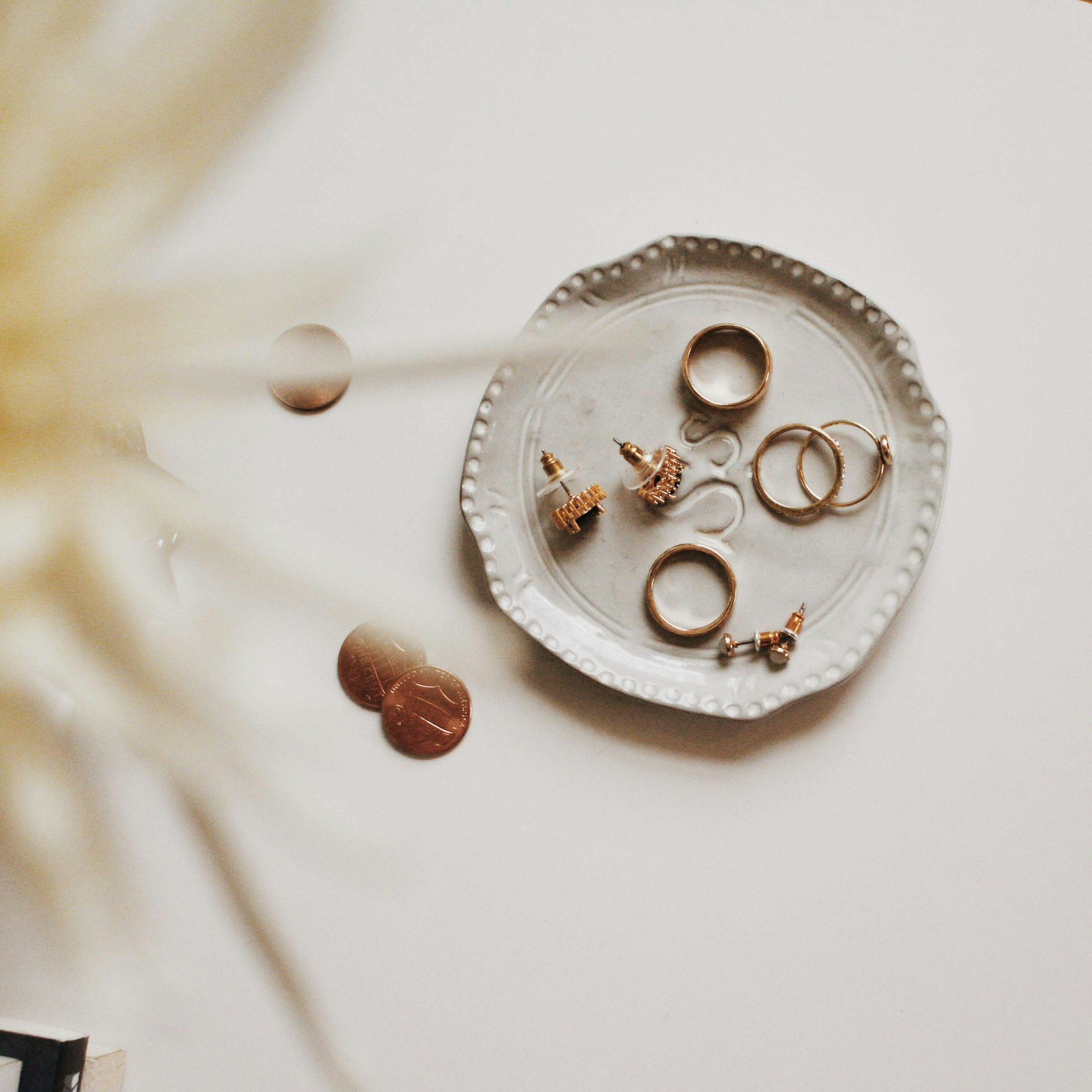 Divifa editorial — gold jewelry flatlay